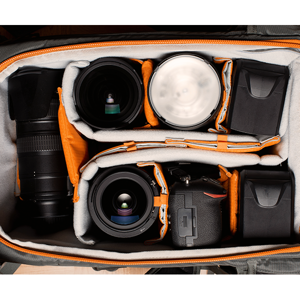What equipment does a freelance photojournalist need